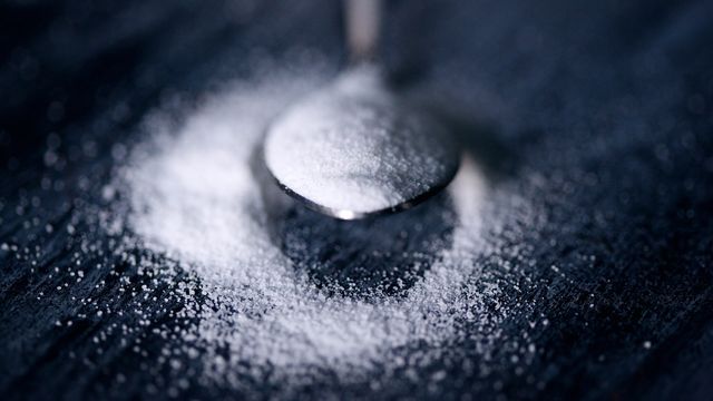 Sweetener on a metal spoon. 