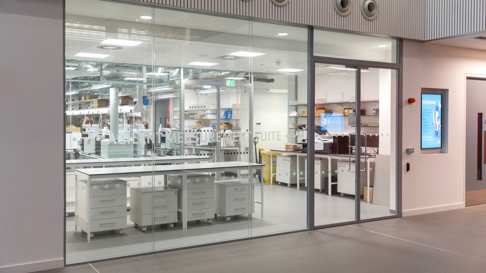 Photograph of the Agilent Measurement Suite at Imperial College London taken through the window.