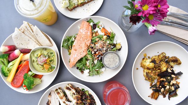 Different plates of food, each with a protein source. 