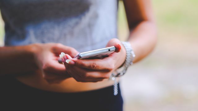 A woman using a smartphone. 