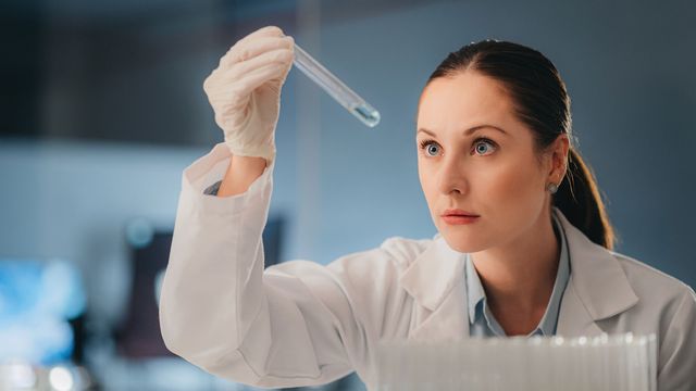 Scientist with liquid sample 